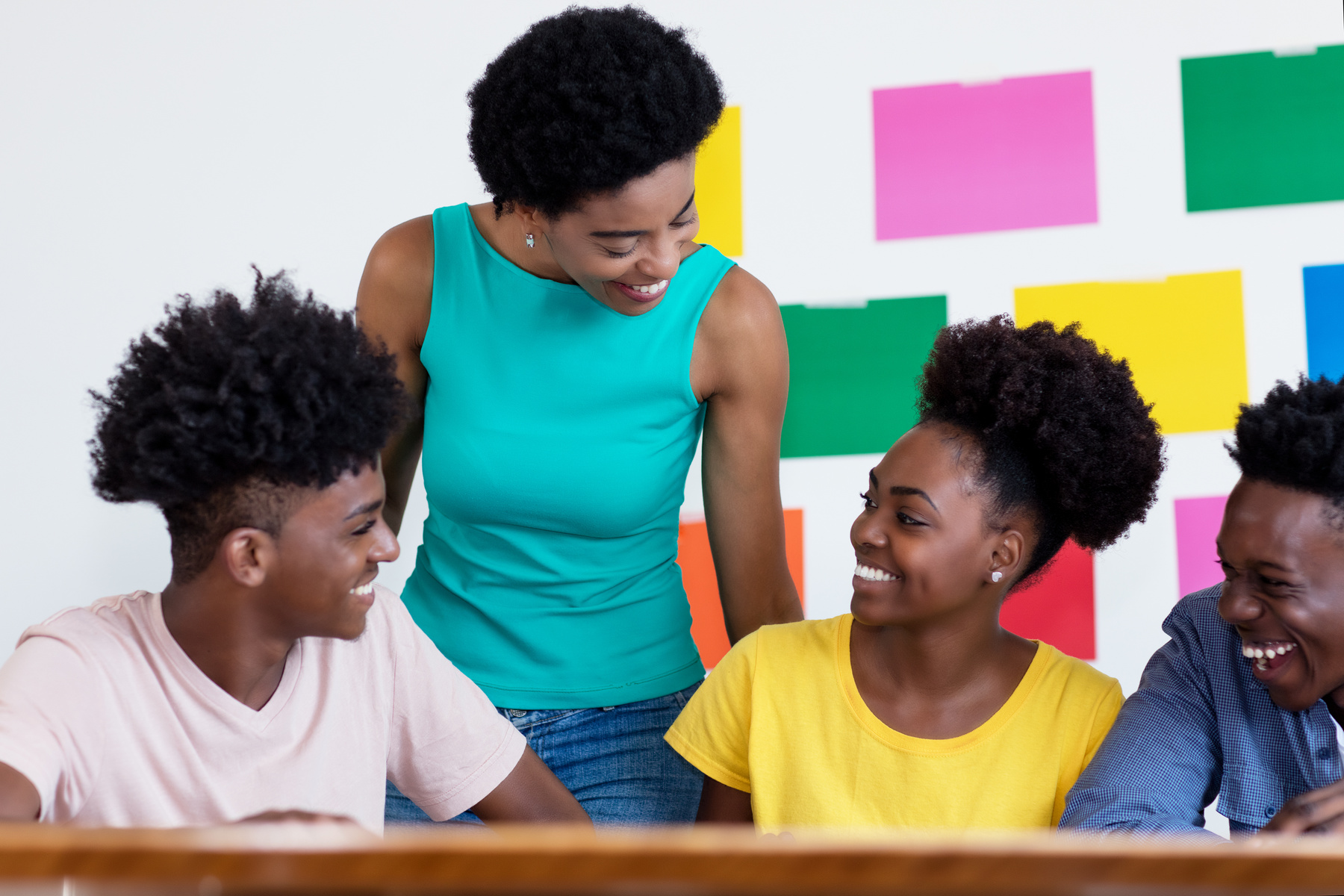 African american female professor learning with students